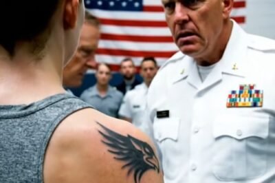“Remove your jacket, Cadet.” The inspector’s voice was full of contempt. He wanted to humiliate me in front of the entire barracks. Then, the Base General walked in. He saw the tattoo on my shoulder, and his voice cracked. “My God… Who gave you permission to wear that?” 