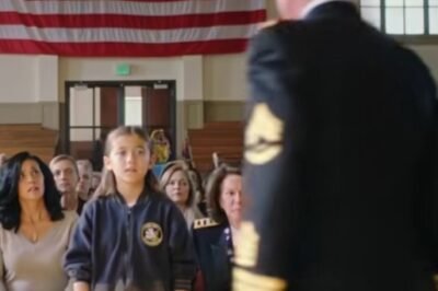 She walked into the cafeteria wearing an old, faded jacket… and the kids laughed. But when a four-star general saw the ghosted patch above her heart, his tray hit the floor.