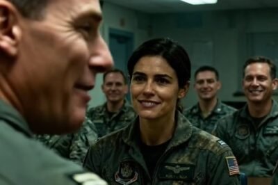 “THE WOMAN IN THE BACK ROW”