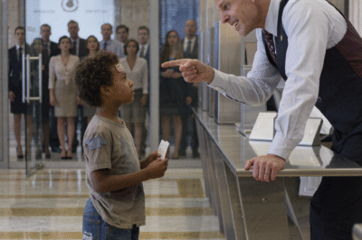 A Black Kid in Torn Shoes Walked into a Bank to Check His Account — The Manager Laughed… Until the Screen Changed His Face Forever
